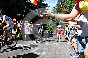 BelgiumÃ¢â¬â¢s Philippe Gilbert of the Quick-Step Floors team waves as he passes fans wishing him a happy birthday